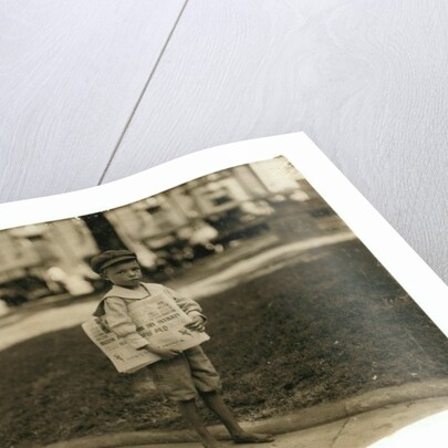 7 year old newsboy Ferris in Mobile, Alabama, 1914 by Lewis Wickes Hine