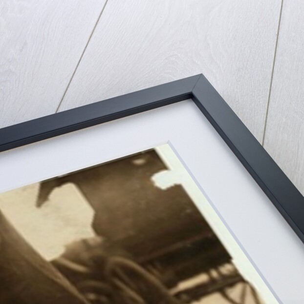6 year old newsboy Hyman selling papers until 6 p.m. in Lawrence, Massachusetts, 1911 by Lewis Wickes Hine