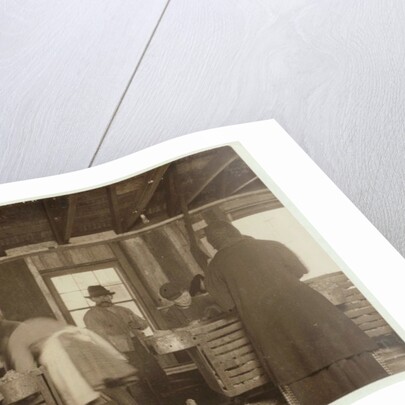 10 year old Mike Murphy, 7 year old Annie Healy and 10 year old Ross Healy in the shucking shed at Alabama Canning Co, Bayou La Batre, Alabama, 1911 by Lewis Wickes Hine