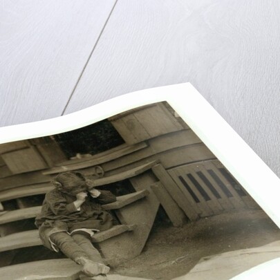 5 year old Olga Schubert began work about 5:00 A.M. helping her mother in the Biloxi Canning Factory, Mississippi, picking shrimps by Lewis Wickes Hine
