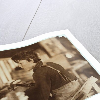 Boy making baskets for melons at Evansville, Indiana, 1908 by Lewis Wickes Hine