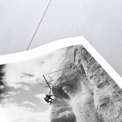 Gutzon Borglum inspecting work on Washington at Mount Rushmore, 1932 by American Photographer