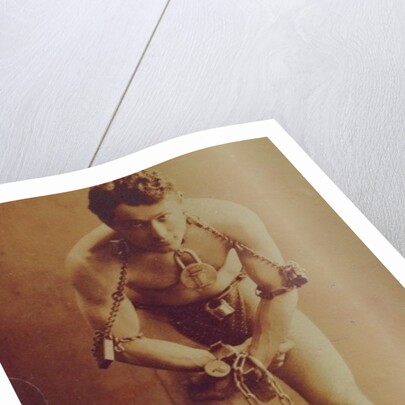 Harry Houdini in chains, c.1899 by American Photographer