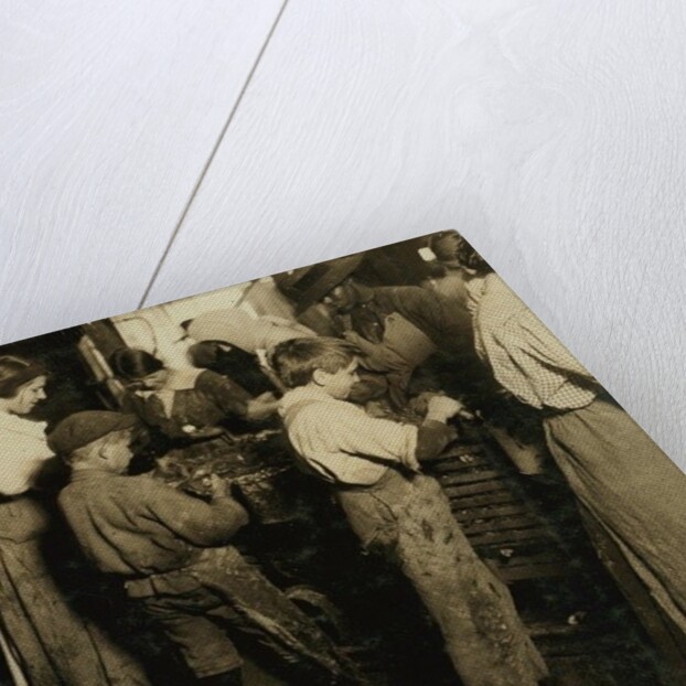 10 year old Jimmie who has been shucking 3 years with an 11 year old boy who shucks 7 pots by Lewis Wickes Hine