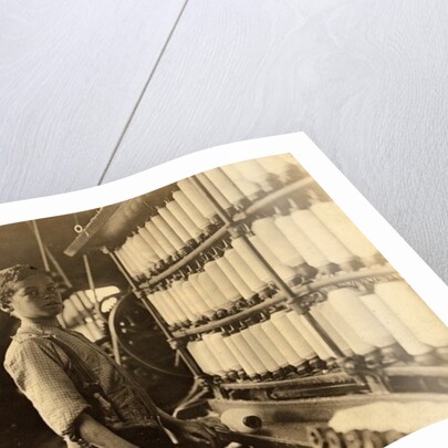 John Dempsey, 11 or 12 years old, Saturday worker in the mule-spinning room at Jackson Mill, Fiskeville, Rhode Island, 1909 by Lewis Wickes Hine