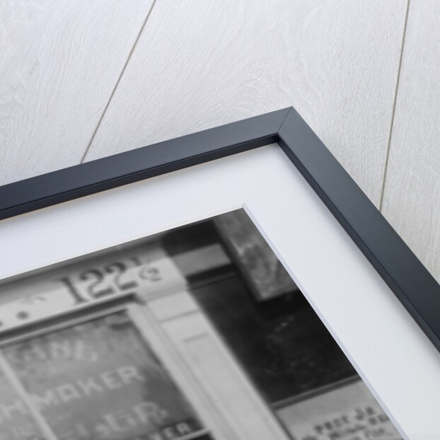 E.J. Crane, watchmaker and jewelry store, c.1899 by American Photographer