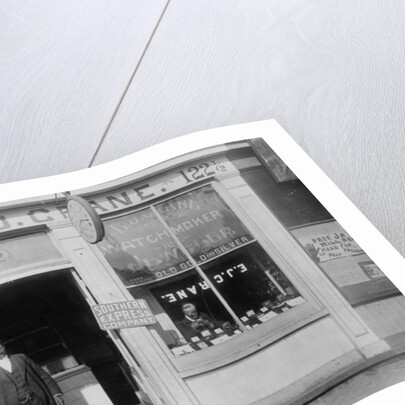 E.J. Crane, watchmaker and jewelry store, c.1899 by American Photographer