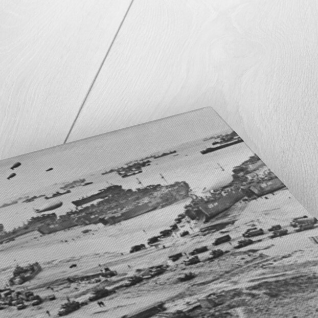 D Day: view of landing craft, barrage balloons, and allied troops landing in Normandy, 1944 by American Photographer