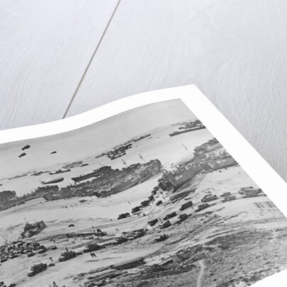 D Day: view of landing craft, barrage balloons, and allied troops landing in Normandy, 1944 by American Photographer