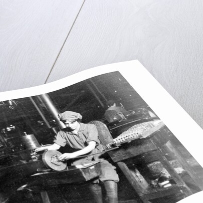 Woman broaching key seat in front sight carrier for rifle, Eddystone Rifle Plant, Eddystone, Pa., during World War I, 1914-18 by American Photographer
