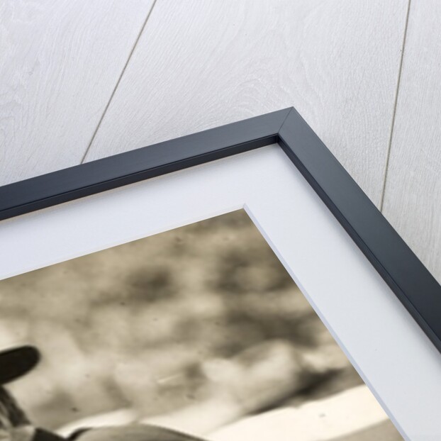 Theodore Roosevelt smiling from an automobile by Anonymous