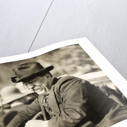 Theodore Roosevelt smiling from an automobile by Anonymous