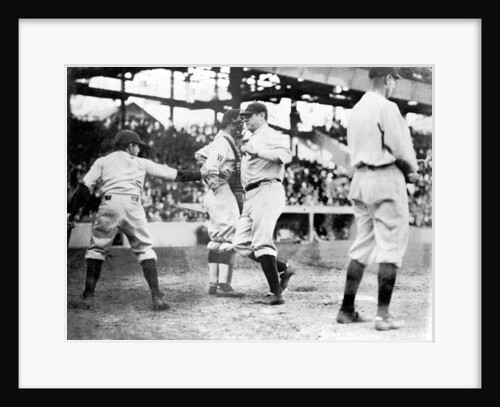 Babe Ruth crossing the plate after making his first home run of the season today, 21st April 1924 by Anonymous