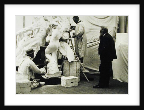 Auguste Rodin in his Paris studio watching the construction of a sculpture, 1905 by Anonymous
