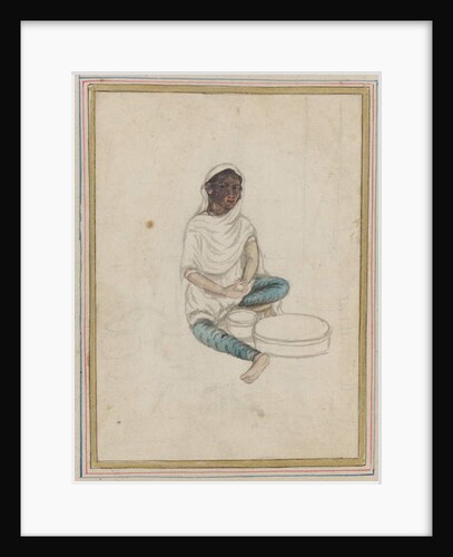 Woman grinding corn by Indian School