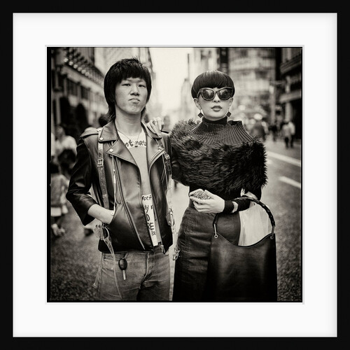Tokyo street scene, couple in Ginza, Japan by Jon Nicholson