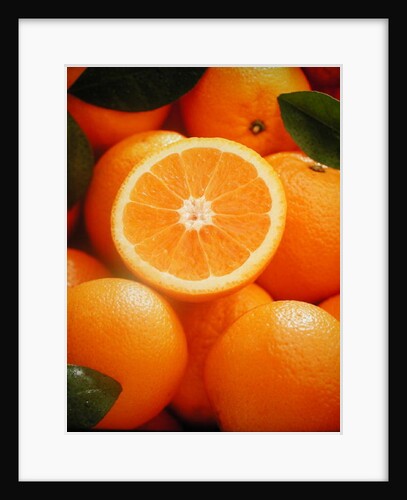 Oranges and cut orange, 1996 by Norman Hollands