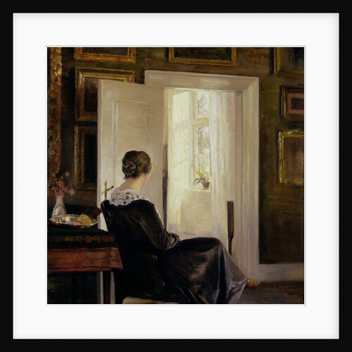 A woman seated near a door by Carl Holsoe