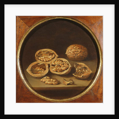 A Still Life of Cracked Walnuts resting on a Stone Ledge by Antonio (circle of) Pereda y Salgado