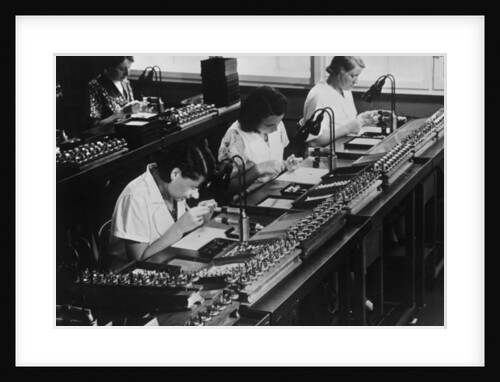 Assembly line for television broadcasting equipment at the Telefunken manufacturing plant, Berlin, c.1935 by German Photographer