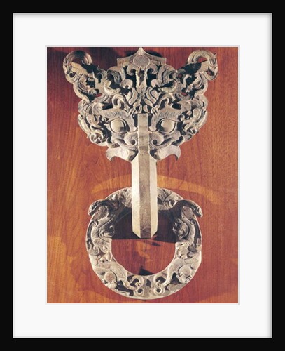 Pu shou' door knocker with a taotie design surmounted by a phoenix and holding a ring with sculpted animals by Chinese School