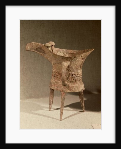 Three-legged 'chueh' vessel for heating wine with a taotie design by School Chinese