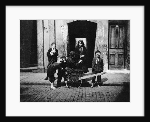 Children in a London slum by English Photographer