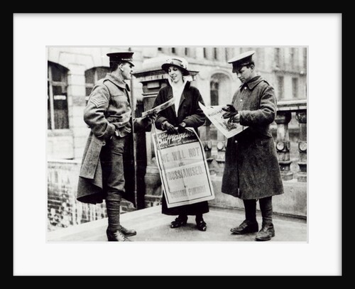 A Suffragette selling newspapers to two soldiers, c.1914 by English Photographer