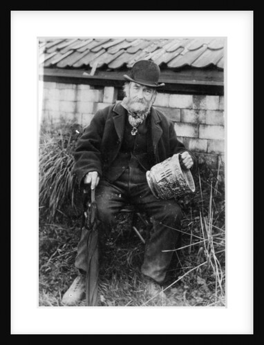 Edward Bingham holding one of his Castle Hedingham Ware designs by English Photographer