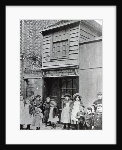 Children outside John Pounds's workshop, from which he ran the first Ragged school by English Photographer