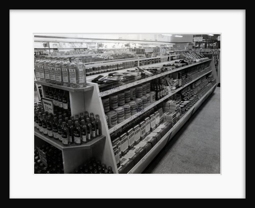 Paint and brushes aisle, Woolworths store, 1956 by English Photographer
