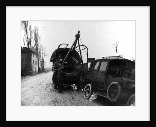 British soldiers towing a motor vehicle in Italy during WWI by English Photographer