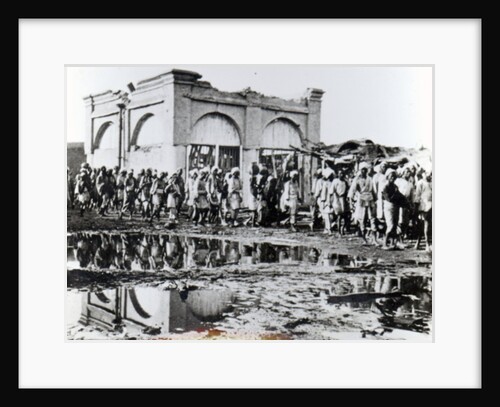 Prisoners passing the 'Mihrab,' the Khalifa's Prayer House, 1898 by English Photographer