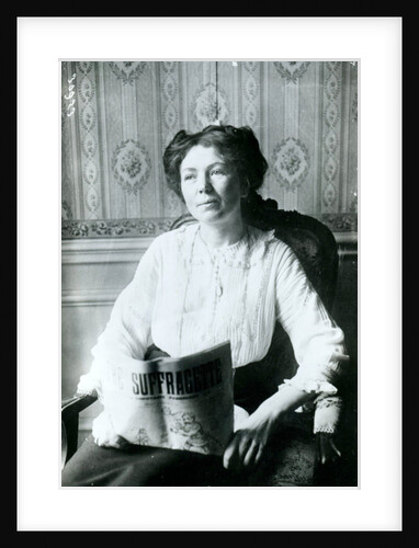 Portrait of Christabel Pankhurst reading a copy of 'The Suffragette' c.1905 by English Photographer