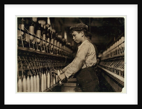 A doffer replaces full bobbins at Globe Cotton Mill, Augusta, Georgia, 1909 by Lewis Wickes Hine