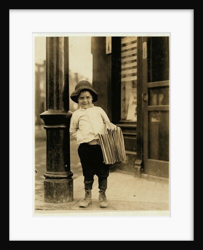 6 year old newsboy, known as Little Fattie and only 3 ft 4 ins tall, has been working for a year in St. Louis, Missouri, 1910 by Lewis Wickes Hine