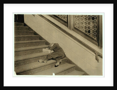 Newsboy asleep with his papers in Jersey City, New Jersey, 1912 by Lewis Wickes Hine