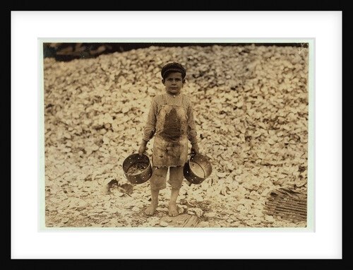 5 year old migrant shrimp-picker Manuel in front of a pile of oyster shells by Lewis Wickes Hine