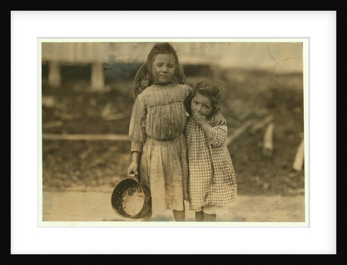 Maud and Grade Daly, 5 and 3 years old pick about a pot of shrimp each day for the Peerless Oyster Company, Bay St. Louis, Mississippi, 1911 by Lewis Wickes Hine