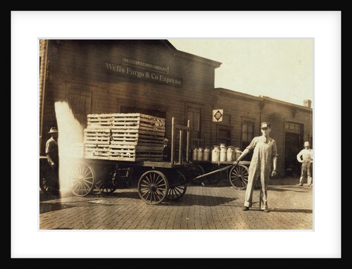 Men in front of a Wells Fargo & Co Express depot with crates and milk cans, Springfiled, Missouri, 1916 by Lewis Wickes Hine