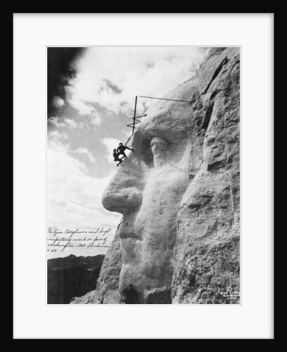 Gutzon Borglum inspecting work on Washington at Mount Rushmore, 1932 by American Photographer