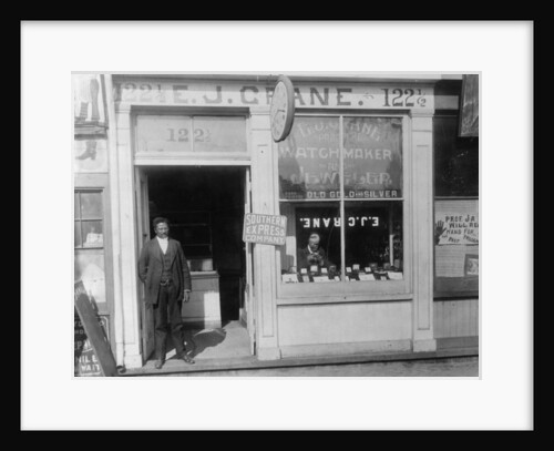 E.J. Crane, watchmaker and jewelry store, c.1899 by American Photographer