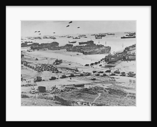 D Day: view of landing craft, barrage balloons, and allied troops landing in Normandy, 1944 by American Photographer