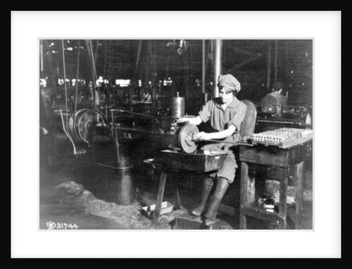 Woman broaching key seat in front sight carrier for rifle, Eddystone Rifle Plant, Eddystone, Pa., during World War I, 1914-18 by American Photographer