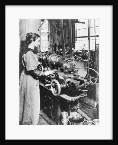 Woman working at internal thread milling machine, Norton Grinding Co., Worcester, Ma., during World War I by American Photographer