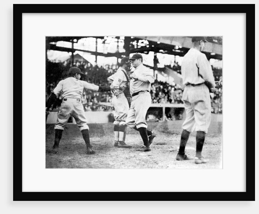 Babe Ruth crossing the plate after making his first home run of the season today, 21st April 1924 by Anonymous