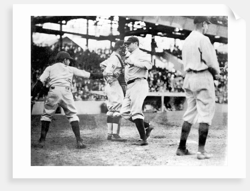 Babe Ruth crossing the plate after making his first home run of the season today, 21st April 1924 by Anonymous