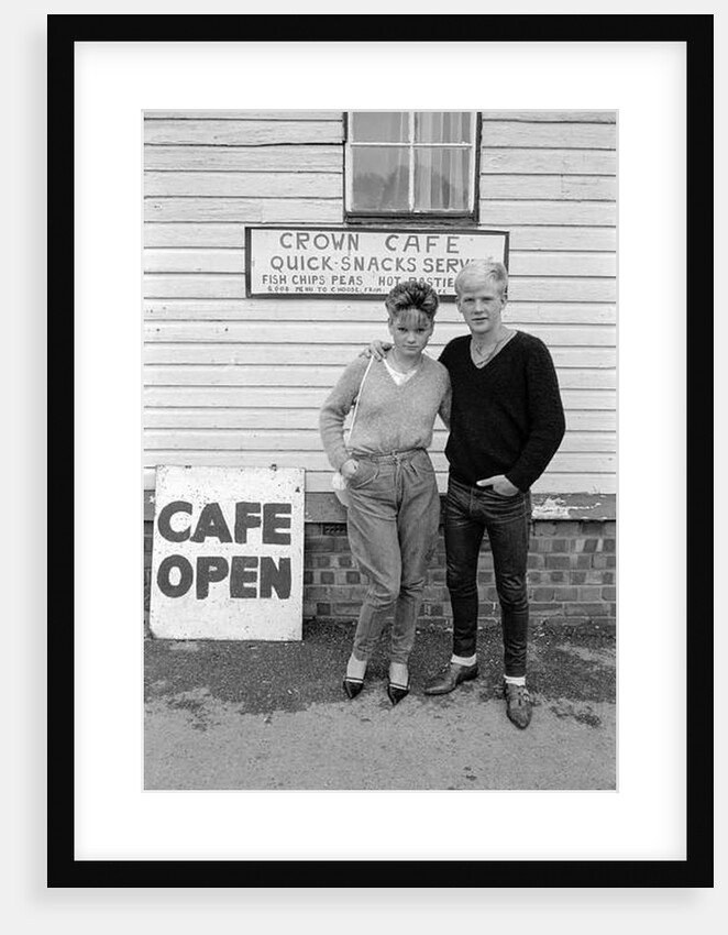 Kids day trip to Butlin's Holiday Camp, Skegness. Young couple pose outside the Crown Cafe. 17.08.83 by Bill Stephenson