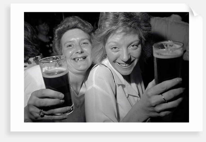 Revellers at Josephine's Nightclub, Barkers Pool, Sheffield, UK. The girls are drinking Pils lager and blackcurrant cordial. 1992. by Bill Stephenson