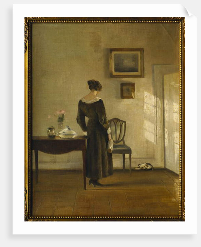 An Interior with a Woman feeding a Cat by Carl Holsoe